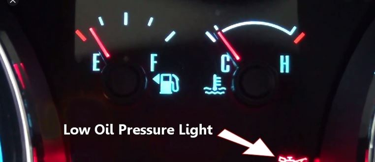 What causes low oil pressure on diesel engine