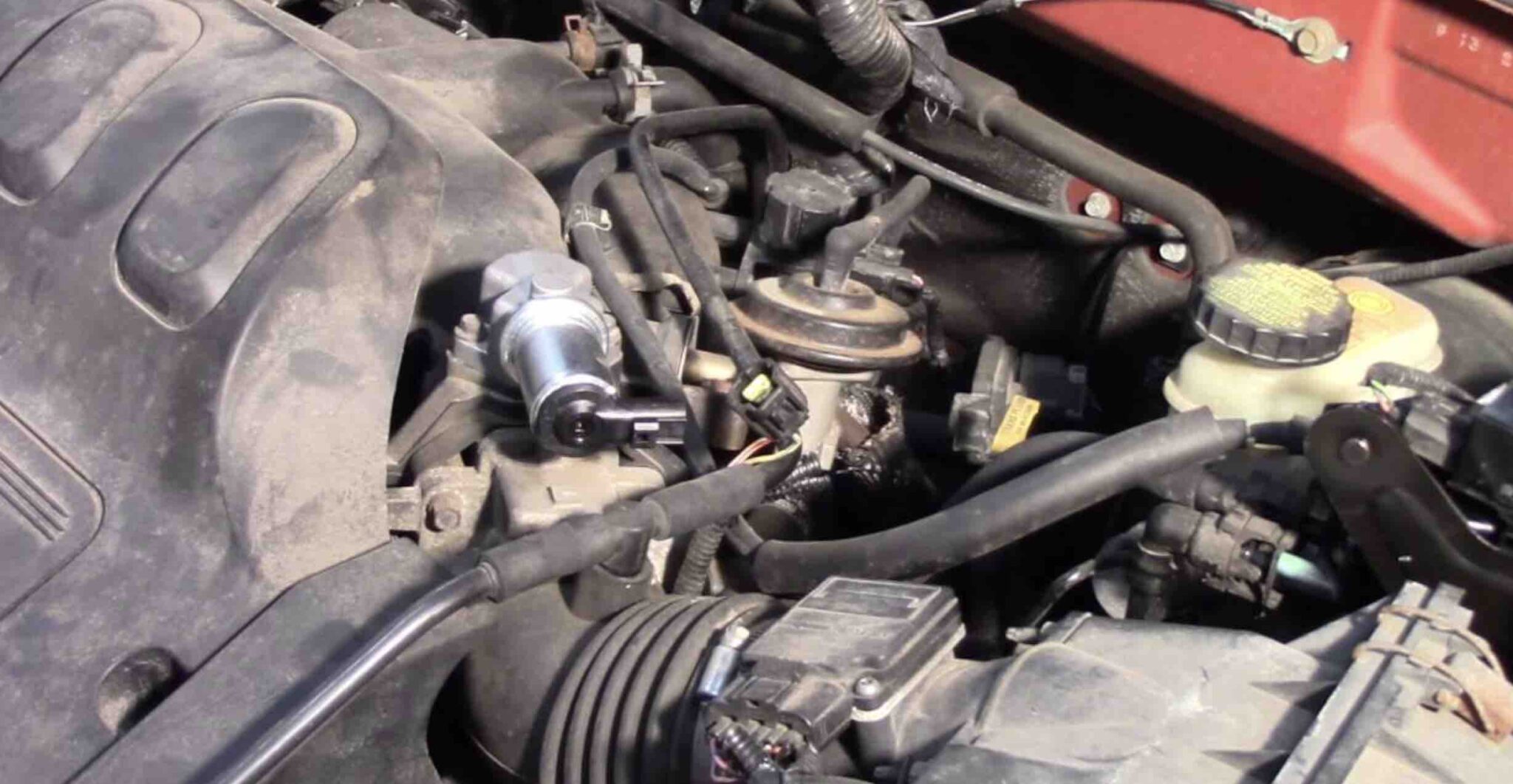 Symptoms of a bad idle air control valve, Reset, and Replacement cost